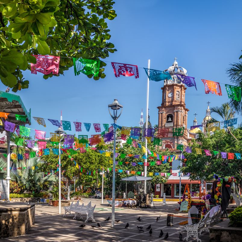 town square celebration with church of lady of guadalupe