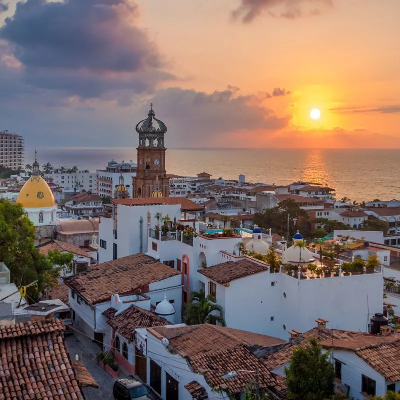 aerial view at sunset of old town puerto vallarta with church of guadalupe