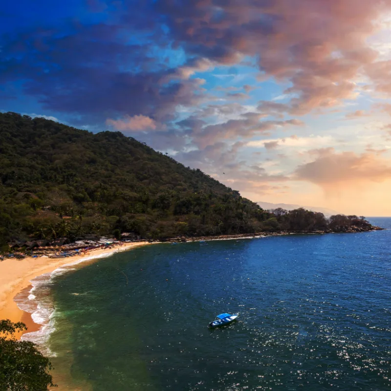 Puerto Vallarta beaches, sunsets and scenic ocean views near Bay of Banderas coastline.