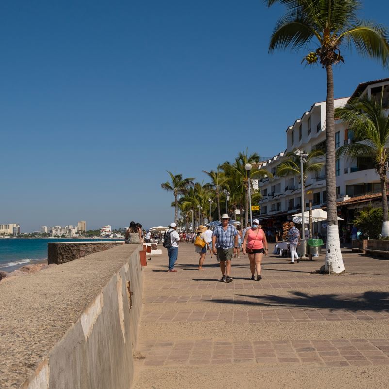 tourists walking along boardwalk