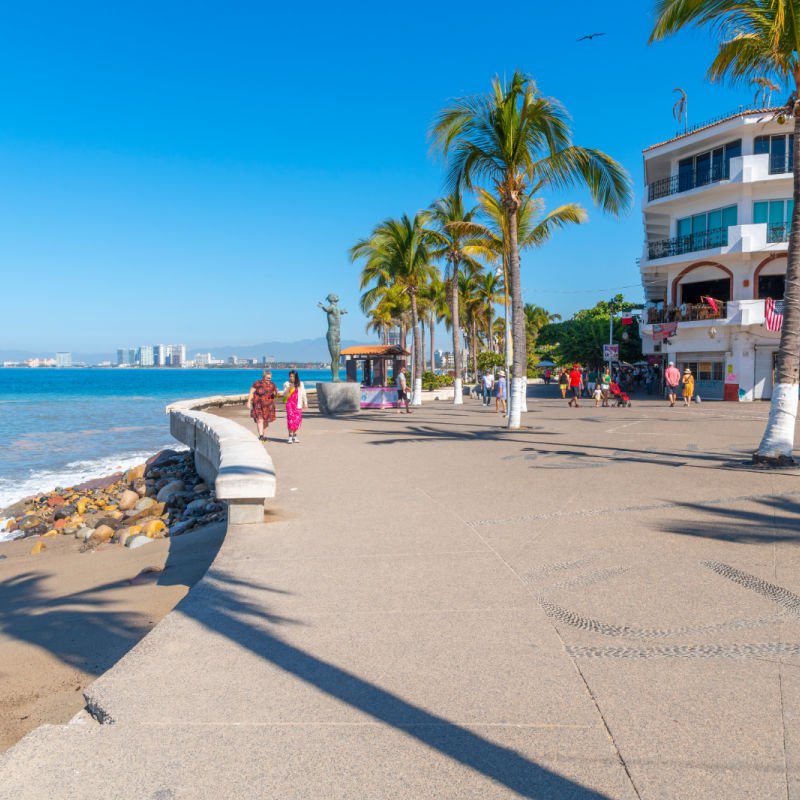 The popular Malecon oceanside promenade at Olas Altas Beach at the Mexican resort town of Puerta Vallarta